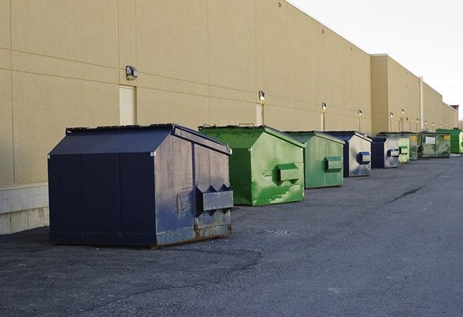 dumpsters lined up for use on busy construction site in Andrews, SC